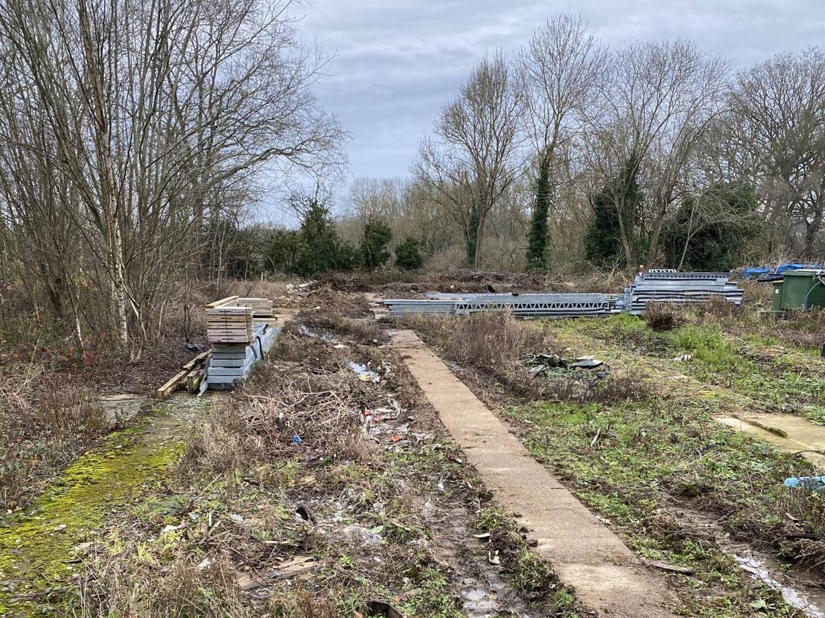 The former Mark Oak nursery site in Fetcham, looking north across the cleared grounds towards trees