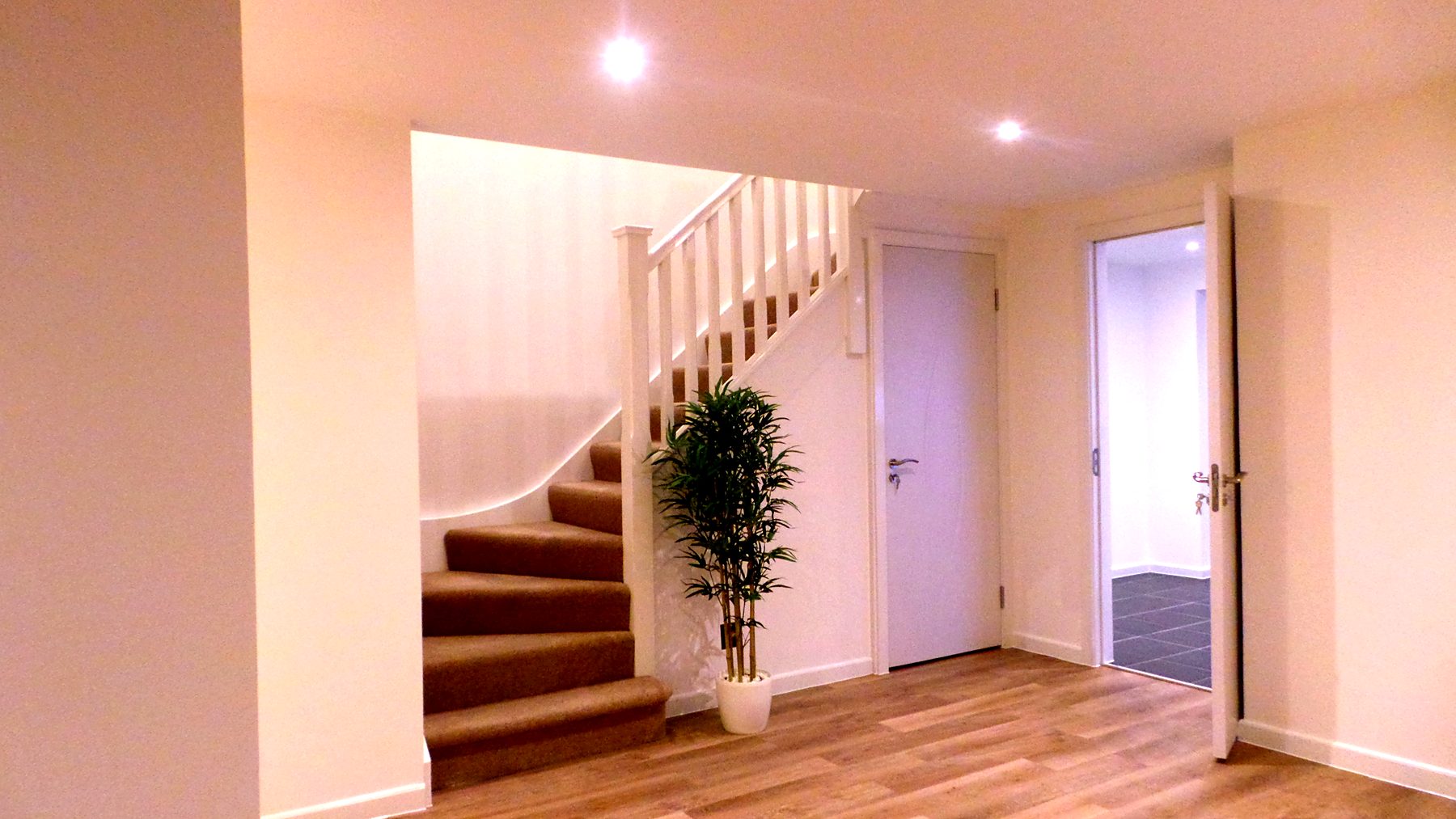 Finished hallway and staircase inside the light gauge steel showhouse